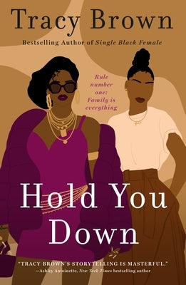 Paperback of "Hold You Down" by St. Martin's Griffin featuring a close-up of the book cover with bold title text.