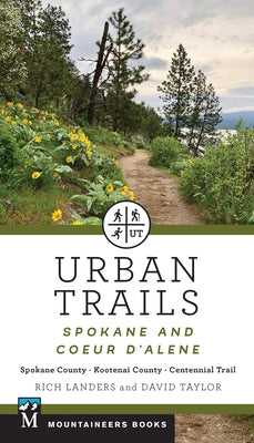Paperback book titled "Urban Trails: Spokane and Coeur d'Alene" by Mountaineers Books, featuring trail maps and scenic trail scenes.
