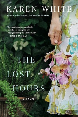 Paperback of The Lost Hours novel by Berkley Books with a cover featuring a mysterious, dark-themed design.