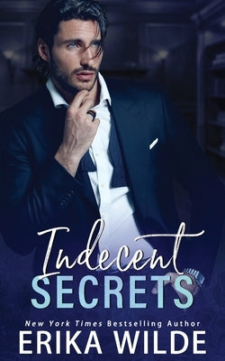 Paperback novel "Indecent Secrets: Enemies to Lovers" by Independently Published, showing the book cover with title and author.