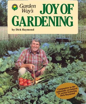 Paperback copy of Garden Way's Joy of Gardening by Storey Publishing featuring colorful garden illustrations.