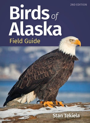 Paperback Birds of Alaska field guide by Adventure Publications featuring colorful illustrations of various Alaskan bird species.