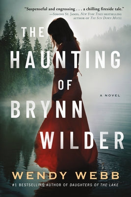 Paperback of The Haunting of Brynn Wilder book by Lake Union Publishing, showing the front cover with haunting artwork.