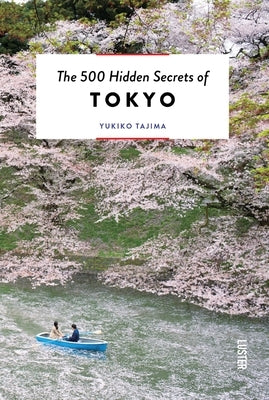 Paperback book titled The 500 Hidden Secrets of Tokyo by Uitgeverij Luster, featuring a colorful cover with Tokyo cityscape.