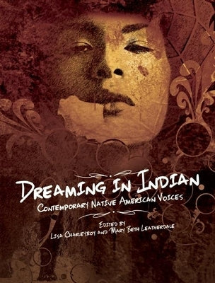 Paperback of Dreaming in Indian: Contemporary Native American Voices with colorful cover art by Annick Press.