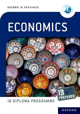 Oxford University Press Economics paperback book titled "Ib Prepared" with a blue cover and titled pages visible.