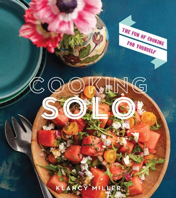 Paperback copy of "Cooking Solo: The Fun of Cooking for Yourself" by Harvest Publications, featuring a colorful cover with cooking illustrations.