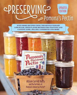 Paperback book titled "Preserving with Pomona's Pectin" by Fair Winds Press, featuring recipes for low-sugar jam and canning.
