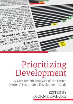 Paperback copy of "Prioritizing Development" by Cambridge University Press, showing the book cover with title and author.