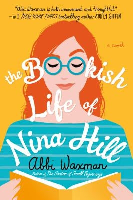 Paperback copy of The Bookish Life of Nina Hill by Berkley Books, featuring a colorful cover with book and floral illustrations.