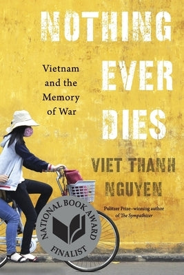 Paperback of "Nothing Ever Dies: Vietnam and the Memory of War" by Harvard University Press, featuring the book cover with Vietnam imagery.