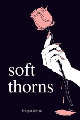 Soft Thorns paperback book by Andrews McMeel Publishing with a colorful cover featuring floral and thorn illustrations.