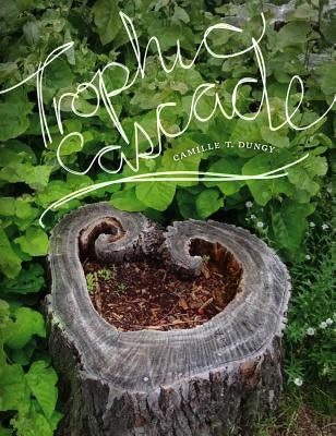 Paperback book titled "Trophic Cascade" by Wesleyan University Press, featuring a cover with natural landscape imagery.
