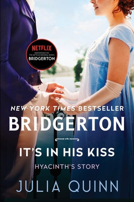 Paperback copy of "It's in His Kiss" from the Bridgerton series by Avon Books, showing the book cover with romantic artwork.