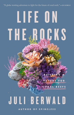 Paperback book titled "Life on the Rocks: Building a Future for Coral Reefs" by Penguin Publishing Group with a colorful cover design.