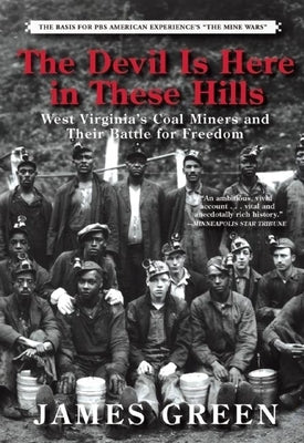Paperback copy of "The Devil Is Here in These Hills" by Grove Press, showing the book cover with title and author details.