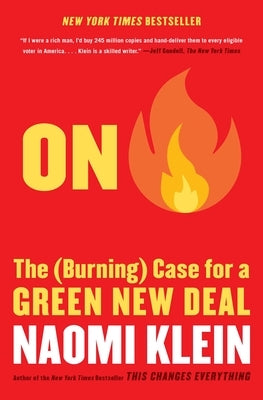 Paperback copy of "On Fire: The (Burning) Case for a Green New Deal" by Simon & Schuster, showcasing the book cover.