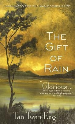 Paperback copy of The Gift of Rain novel by Hachette Books with a cover image featuring Asian-inspired artwork.