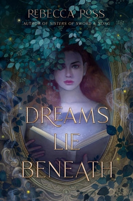 Paperback of "Dreams Lie Beneath" by Quill Tree Books showing the book cover with dark, dreamy artwork and title text.