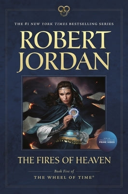 Paperback copy of The Fires of Heaven, Book Five of The Wheel of Time series published by Tor Books, featuring the book cover.