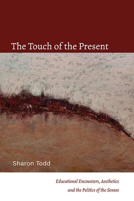 Paperback of "The Touch of the Present" by State University of New York Press featuring the book cover with title and author details.