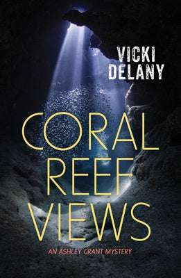 Cover image of "Coral Reef Views" by Ashley Grant, a Rapid Reads mystery novel featuring a vibrant coral reef scene on the cover.