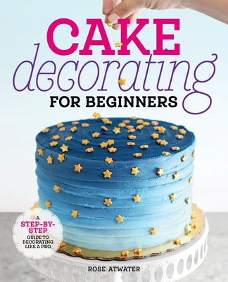 Paperback book titled "Cake Decorating for Beginners" by Rockridge Press, featuring a colorful cake on the cover.