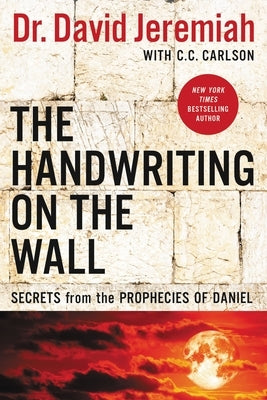 Paperback of "The Handwriting on the Wall" by Thomas Nelson, featuring a cover with ancient script and prophecy illustrations.