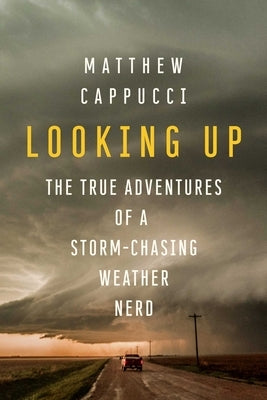 Paperback of "Looking Up: The True Adventures of a Storm-Chasing Weather Nerd" by Pegasus Books, featuring the book cover with storm imagery.
