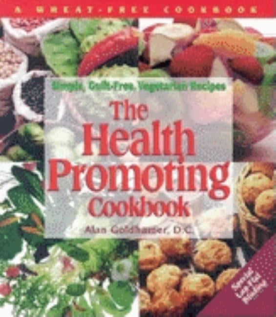 Paperback cookbook titled "The Health-Promoting Cookbook" featuring vegetarian recipes, with colorful dish images on the cover.