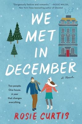 Paperback of "We Met in December" by William Morrow & Company, showing the book cover with festive holiday-themed design.
