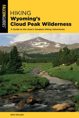 Paperback guidebook titled "Hiking Wyoming's Cloud Peak Wilderness" by Falcon Press Publishing, featuring outdoor trail images.