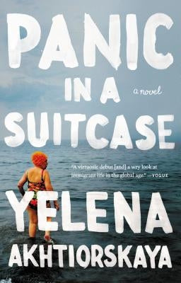 Paperback of Panic in a Suitcase by Riverhead Books featuring the book cover with bold title and author text on the front.