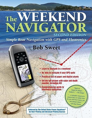 Paperback copy of The Weekend Navigator book by International Marine Publishing featuring boat navigation with GPS and electronic charts.