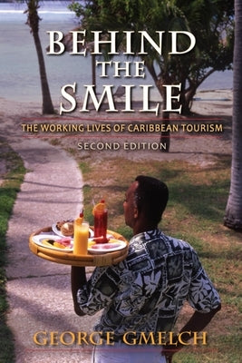 Behind the Smile: The Working Lives of Caribbean Tourism Paperback Indiana University Press