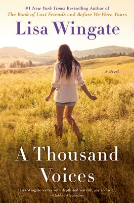 Paperback copy of "A Thousand Voices" novel by Berkley Books, featuring the book cover with title and artwork.
