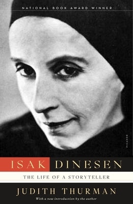Paperback of Isak Dinesen: The Life of a Storyteller by Picador USA, showing the book cover with title and author details.