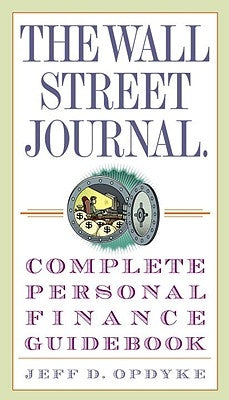 The Wall Street Journal Complete Personal Finance Guidebook by Crown Business, open pages showing financial advice and tips.