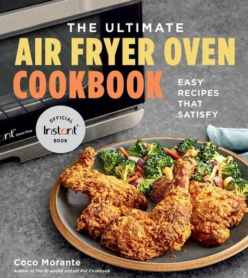 Paperback cookbook titled "The Ultimate Air Fryer Oven Cookbook" by Harvest Publications, featuring colorful recipe pages.