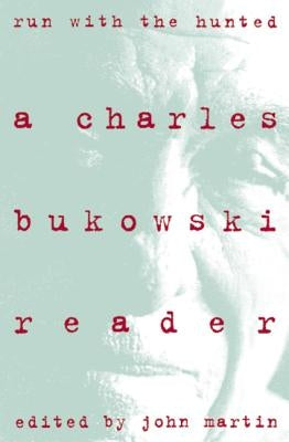 Paperback copy of "Run with the Hunted" Charles Bukowski Reader by Ecco Press, featuring a cover with bold typography and dark artwork.