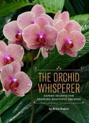 Paperback book titled "The Orchid Whisperer" by Chronicle Books featuring a cover with orchids and gardening tips.