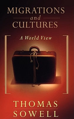 Paperback copy of "Migrations and Cultures: A World View" by Basic Books, showing the book cover with title and author.