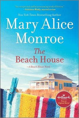 Paperback copy of The Beach House novel by Mira Books featuring a cover with beach scene and ocean waves.