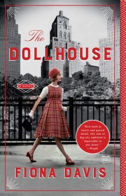 Paperback copy of The Dollhouse novel by Dutton Books, featuring a close-up of the book cover with title and author details.