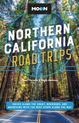 Paperback book titled "Moon Northern California Road Trips" showing scenic coastal, redwood, and mountain drive images with stop highlights.