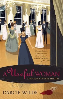 Paperback copy of "A Useful Woman" by Berkley Books, showing the book cover with title and author name.