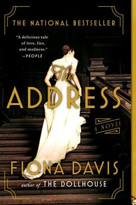 Paperback copy of "The Address" by Dutton Books, showing the front cover with title and author name.