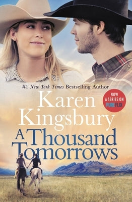 Paperback copy of "A Thousand Tomorrows" by Worthy Books with a cover featuring a scenic landscape and poetic title text.