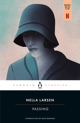 Paperback copy of "Passing" by Penguin Group, featuring the book cover with title and author details.