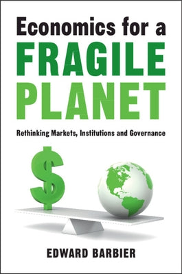 Paperback book titled "Economics for a Fragile Planet" by Cambridge University Press, featuring a cover with eco-themed illustrations.